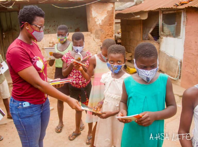 The Founder of Ahsa Life given story books to children